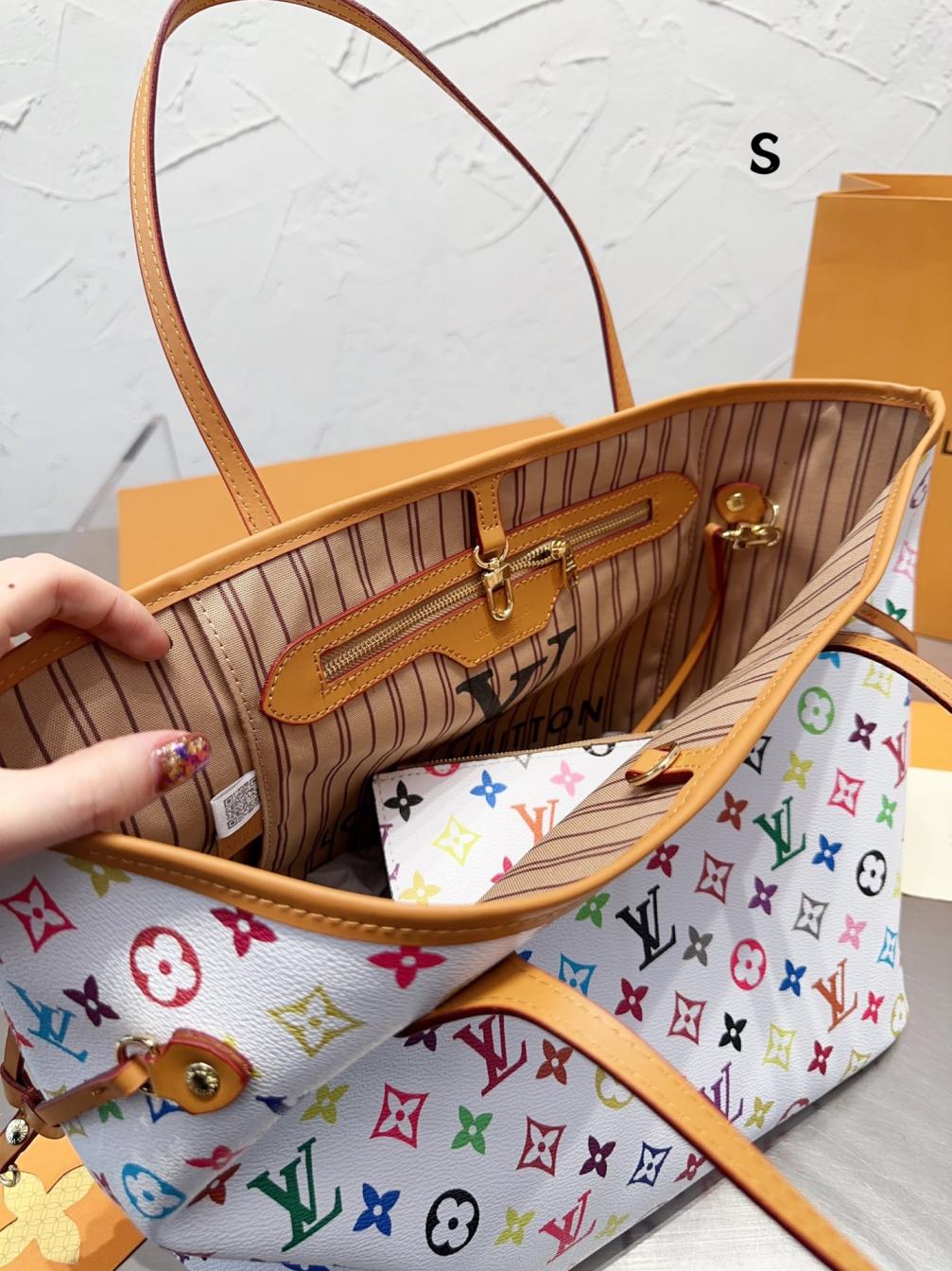 Lv white neverfull hand bag 131657