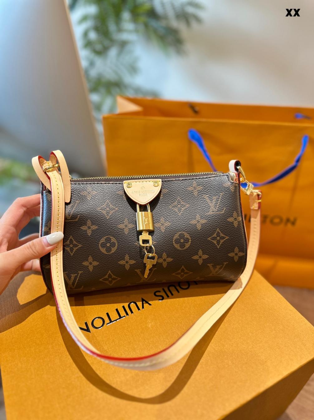 LV Louis vuitton monogram lock handbag
