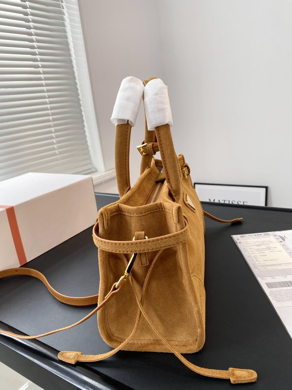 Prada suede soft luxury handbag