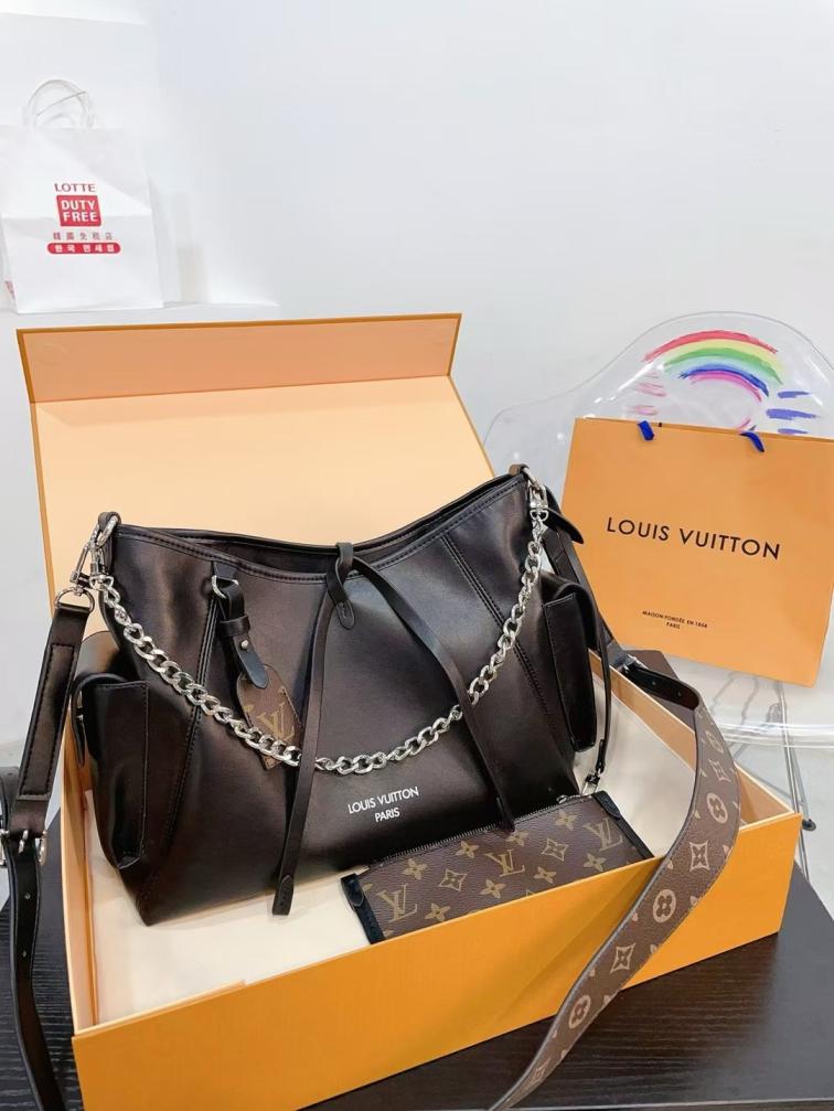 LV CarryAll Dark hand bag 135411