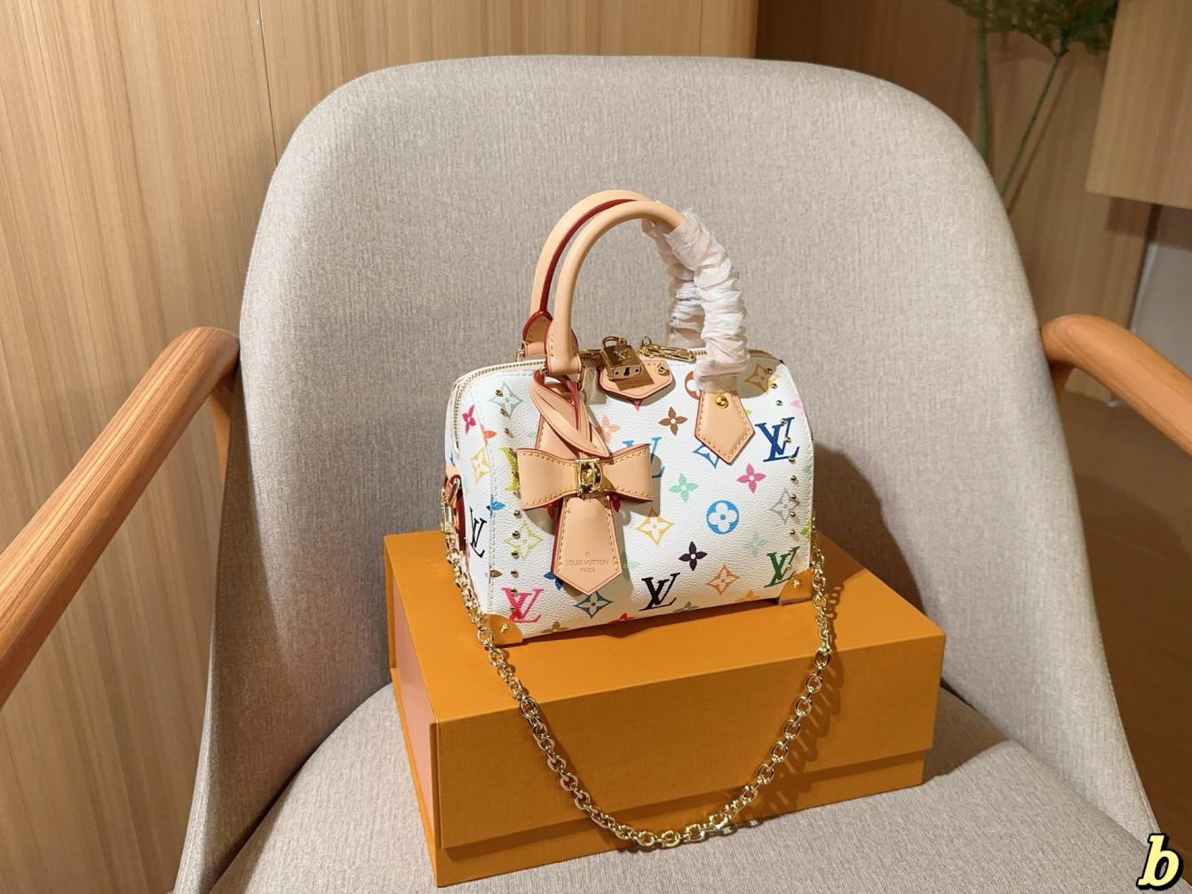 LV speedy trunk 20 handbag 135877