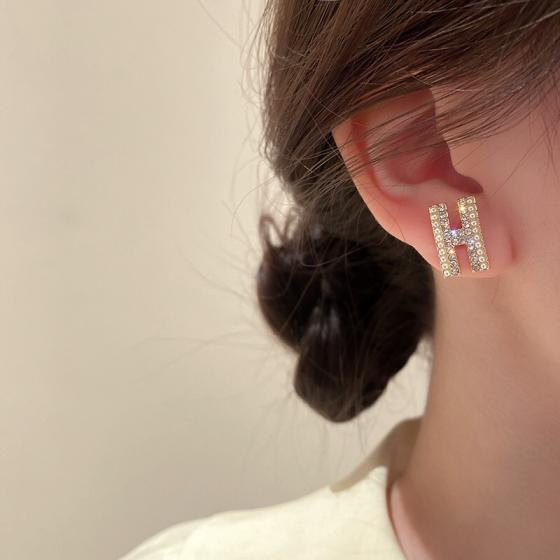 Hermes H earrings