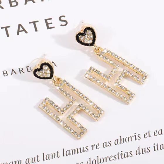 Hermes H heart earrings