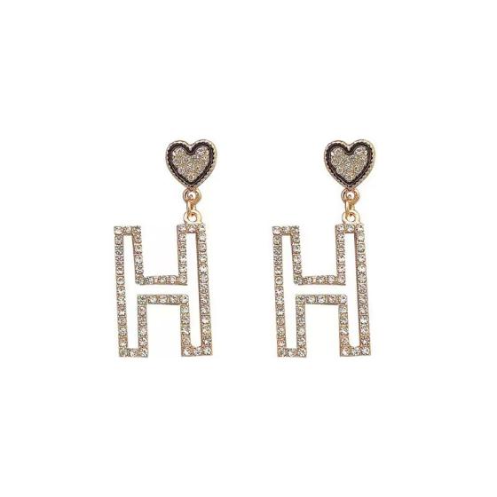 Hermes H heart earrings