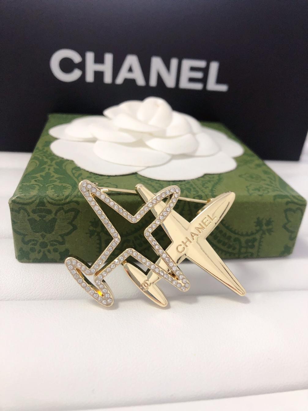 Chanel plane brooch 114339