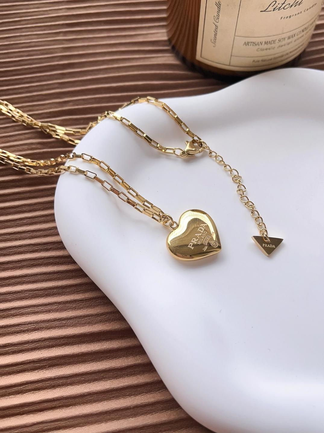 X607 Prada gold heart necklace