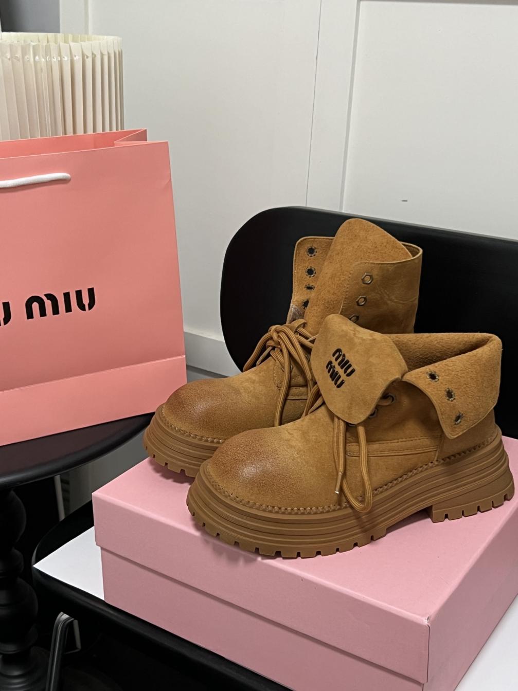 MIUMIU Leather boots
