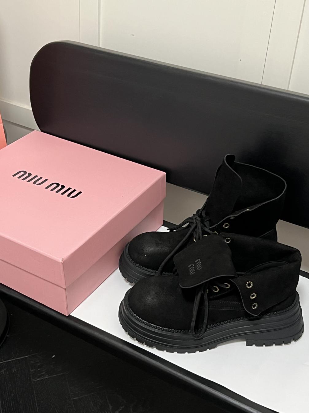 MIUMIU Leather boots