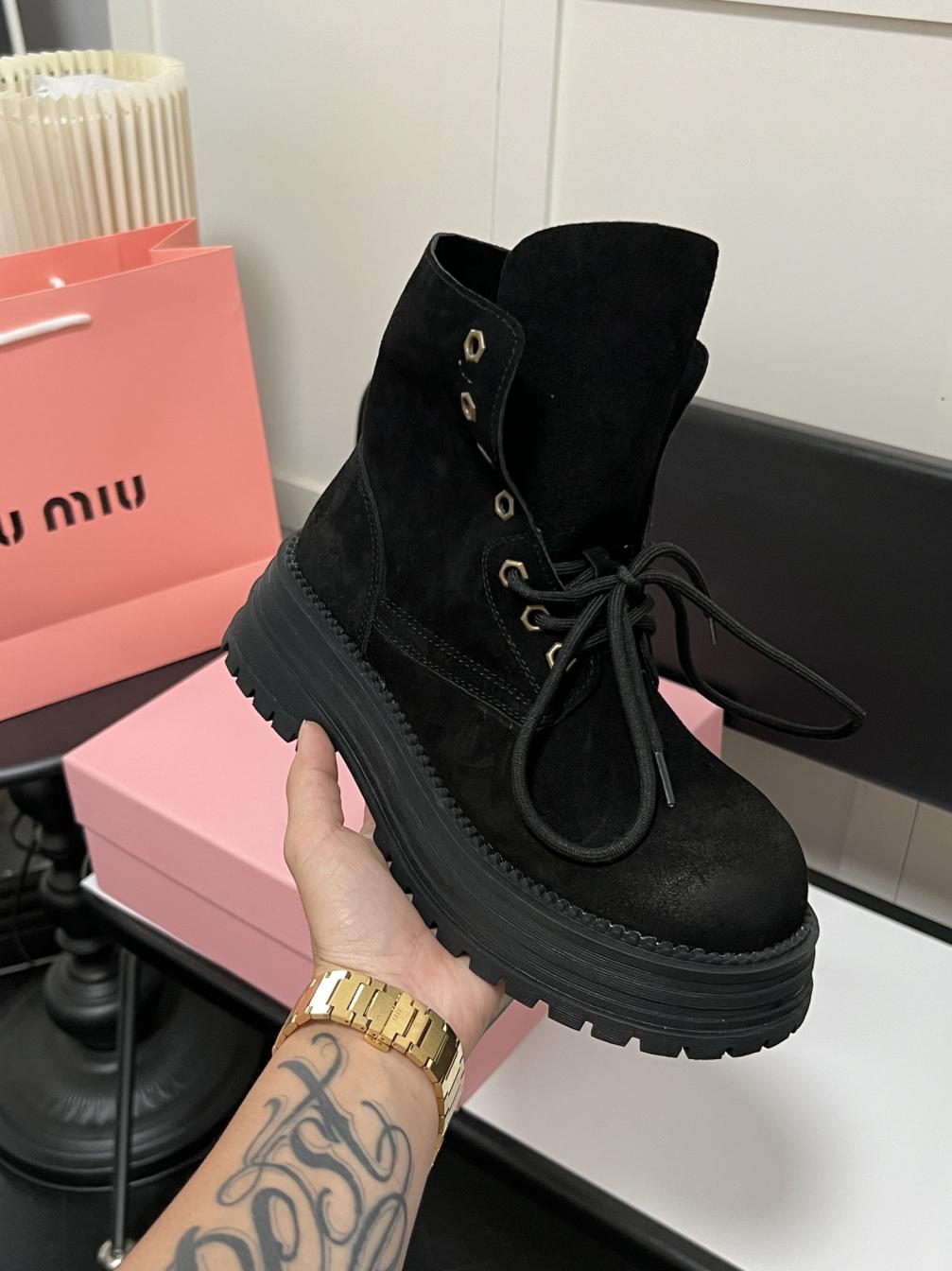 MIUMIU Leather boots