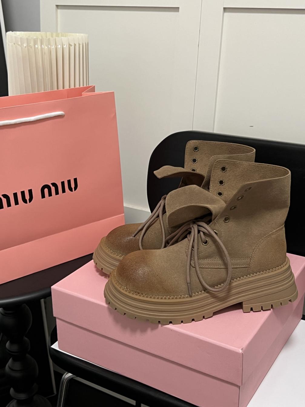 MIUMIU Leather boots