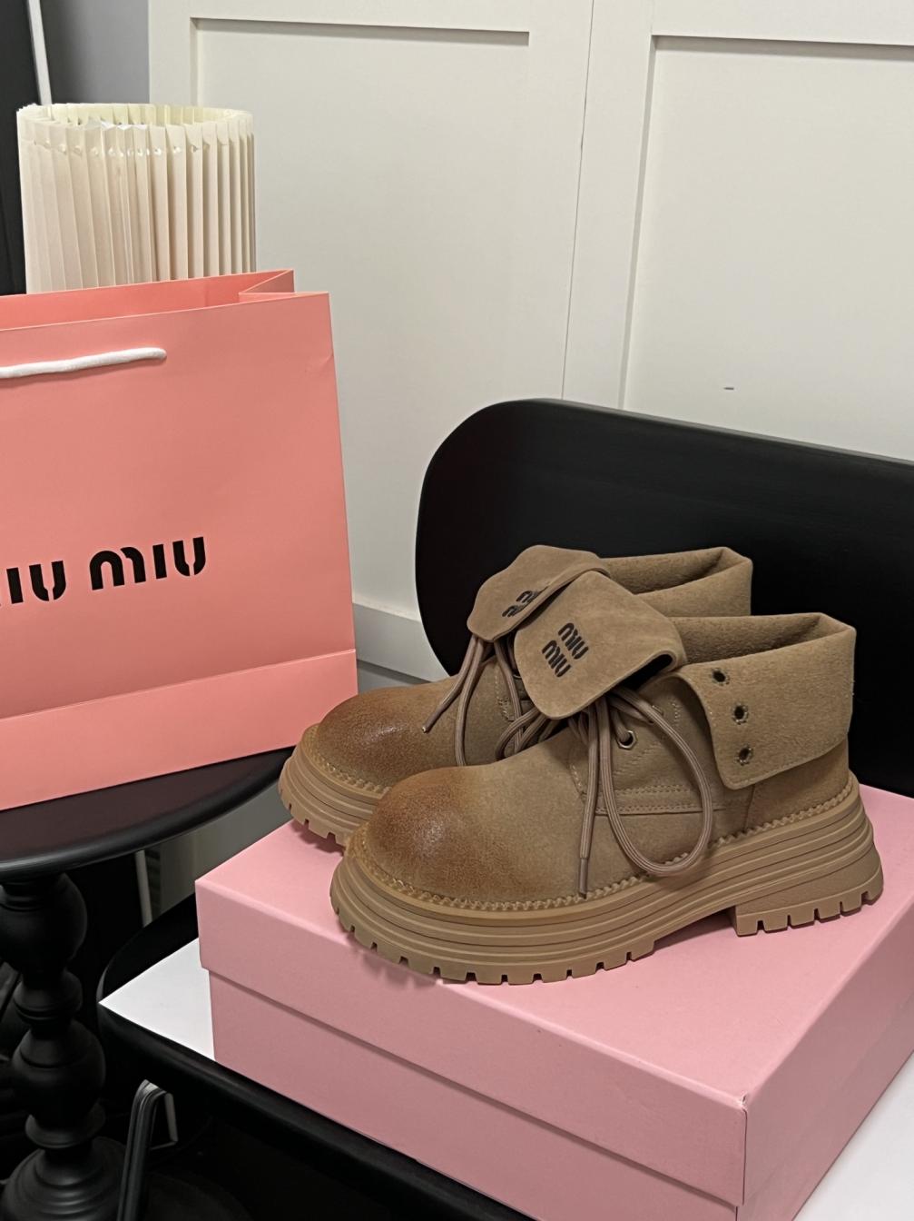 MIUMIU Leather boots